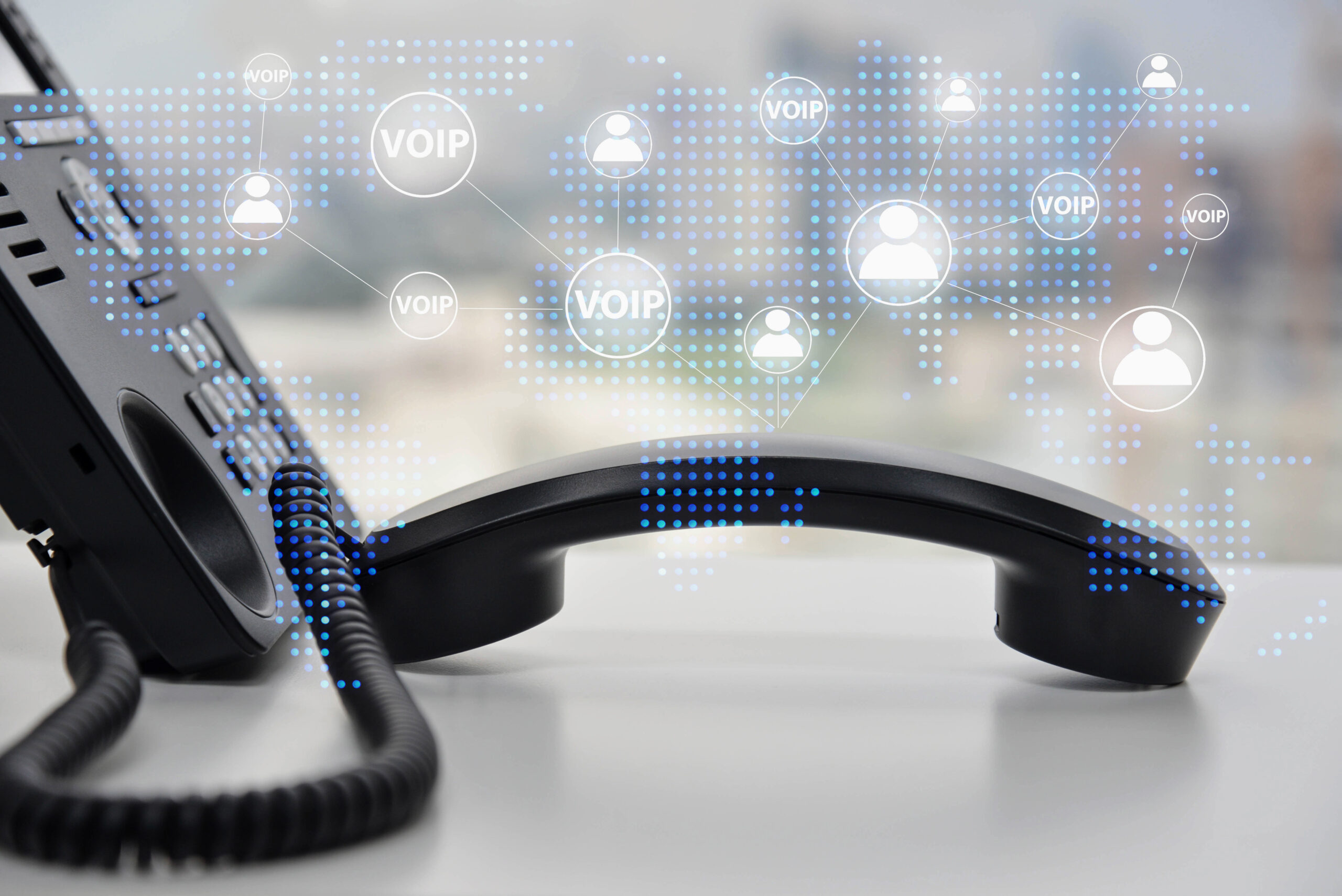 IP Phone double exposure with blue LED world map and business ic