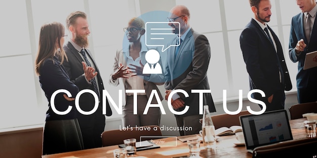 Six professionals in a conference room discuss, with a prominent 'CONTACT US' headline overlaid.